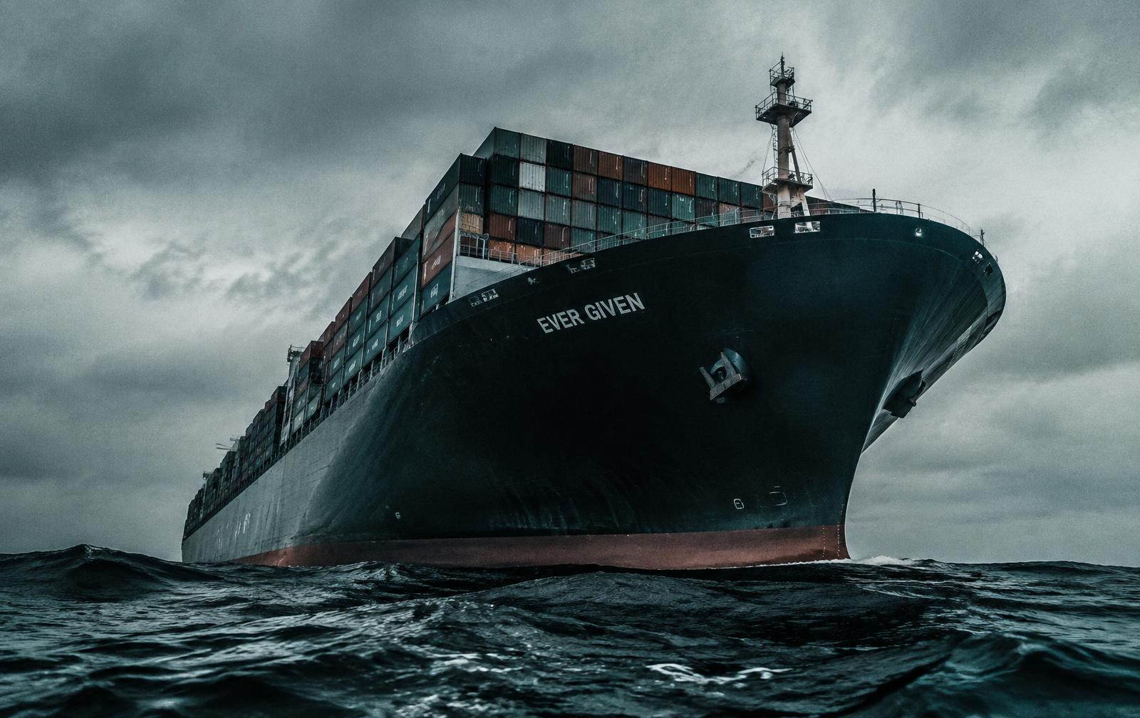 Container ship at sea under an overcast sky